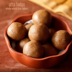 atta laddu served in a brown bowl with text layovers.