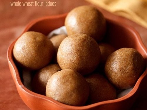 atta ladoo served in a brown bowl with text layovers.