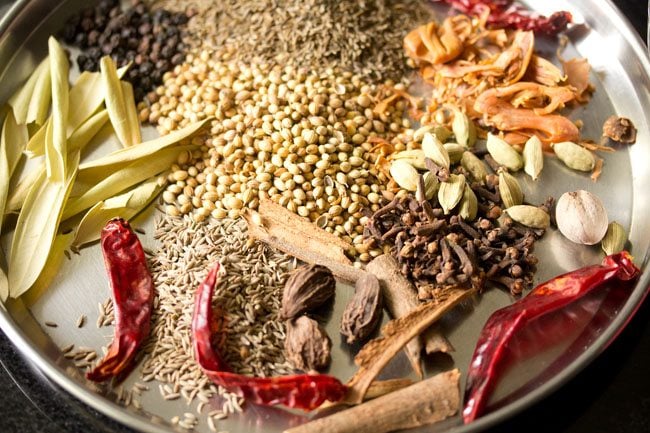 whole spices placed on a plate. 