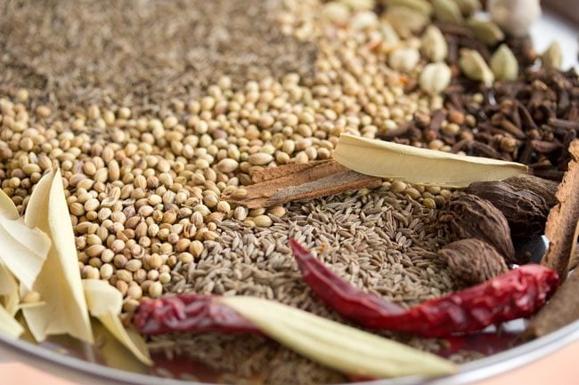 sun drying whole spices. 