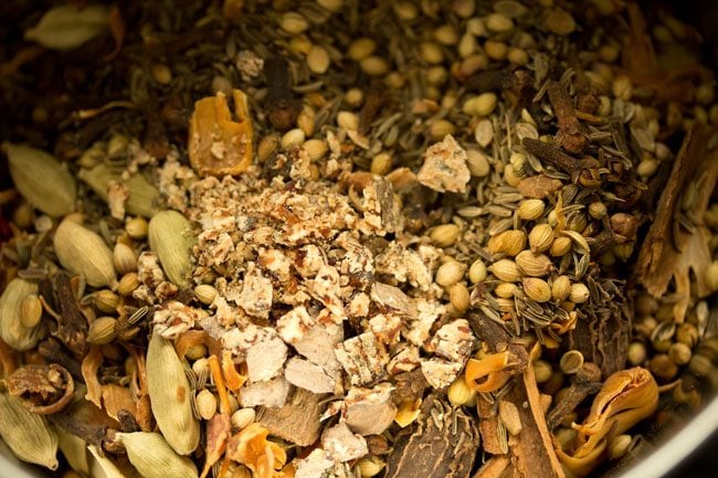 coarsely crushed nutmeg added to grinder jar. 