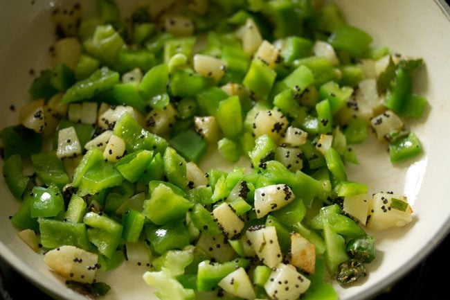 mixing potato capsicum