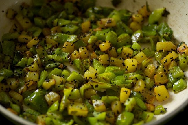 sauteing the capsicum