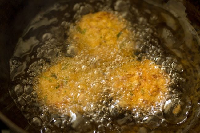 dal vada getting fried in hot oil