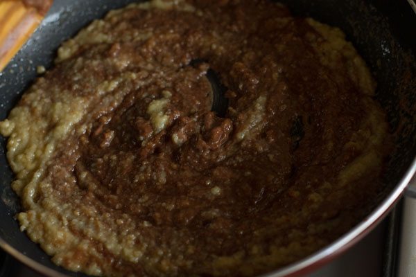 chocolate chips melting in the mawa sugar mixture