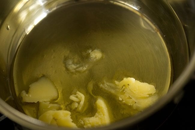 ghee melting in a steel pan