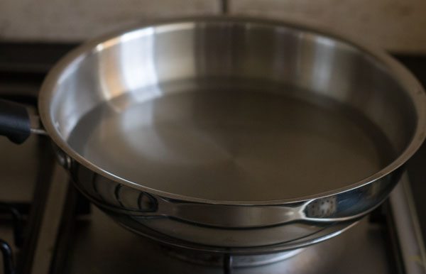 heating water in a pan. 