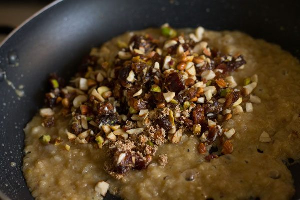 roasted dry fruit-poppy seeds mixture added to the khoya mixture. 