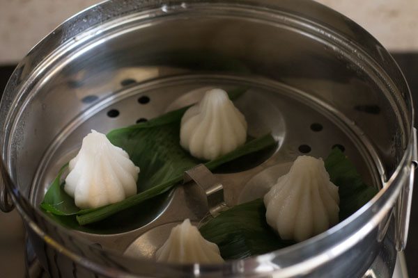 steamed modaks inside the pan. 