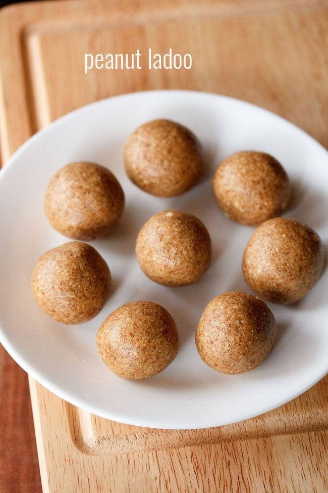 peanut ladoo served on a white plate with text layovers.