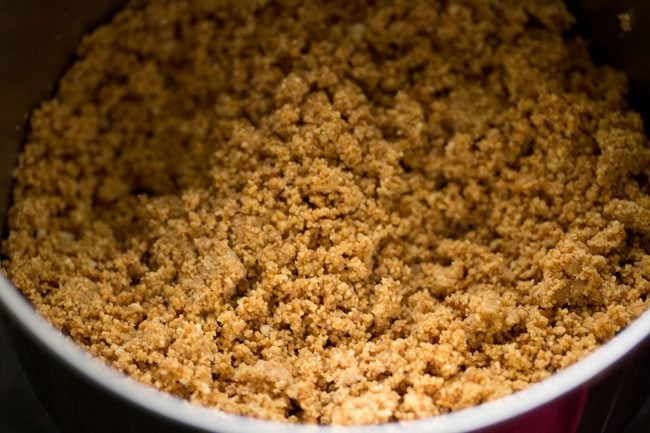 grinding peanuts with jaggery to a coarse ladoo mixture. 