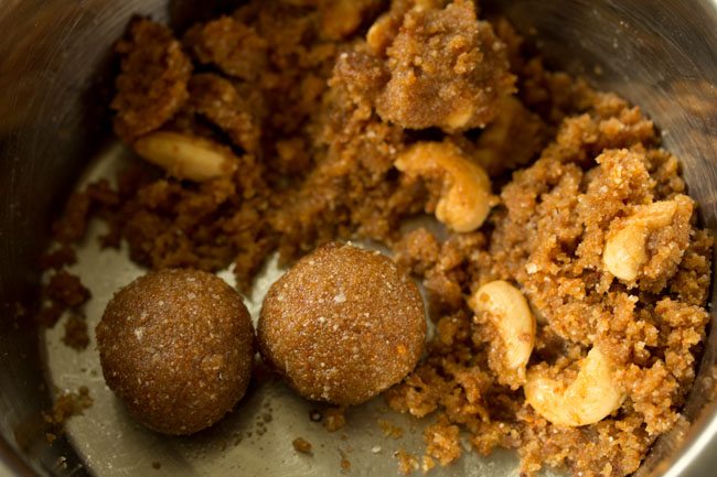 shaping ladoos from the poha mixture. 