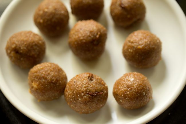 prepared aval laddu on a plate. 