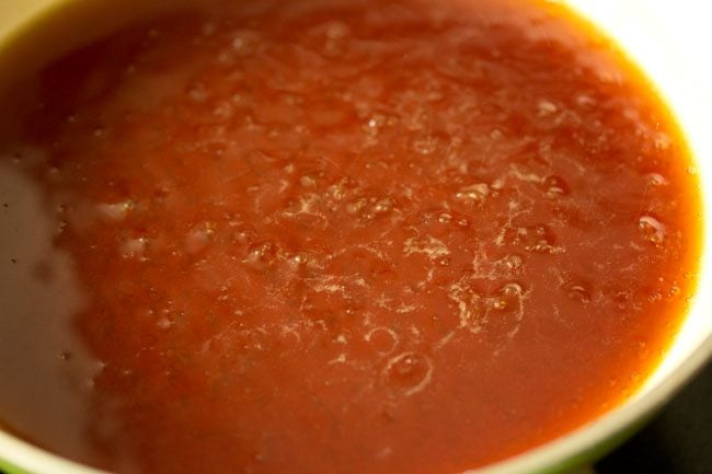 amber colored jaggery solution ready to make sweet pongal