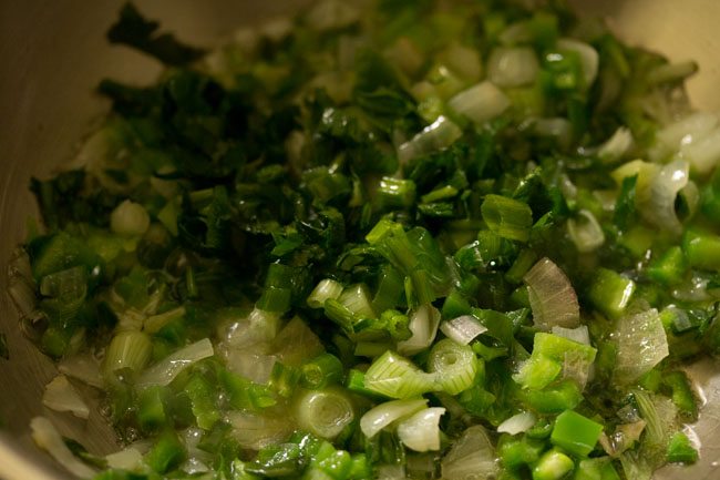 chopped celery added to the wok. 