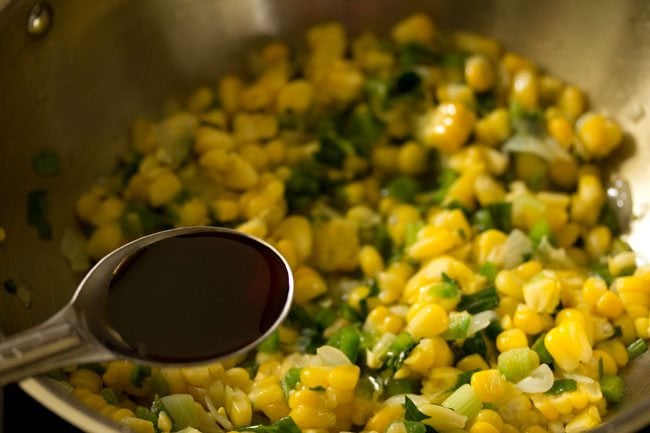 adding fermented soy sauce to the corn mixture. 