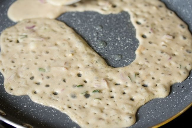 pouring batter on the pan