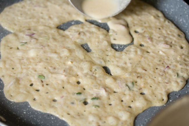 filling gaps in the batter on the pan