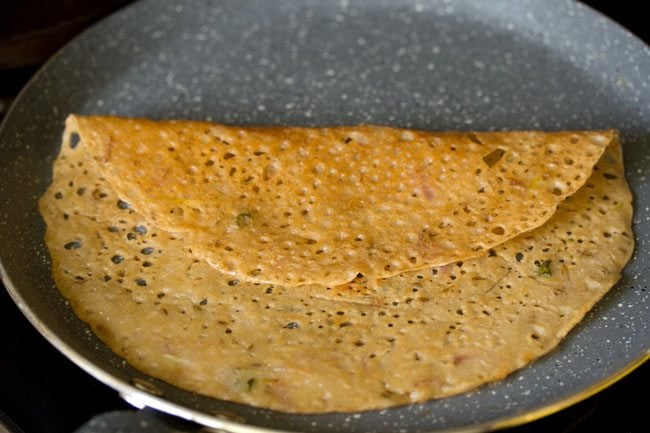 folder wheat dosa on the pan