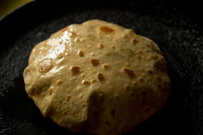 ghee applied on broccoli paratha