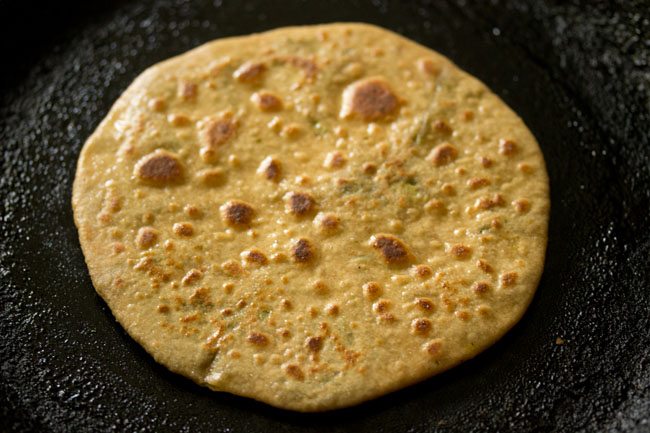 cooked broccoli paratha on tawa