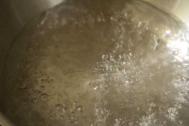 boiling water for chana dal modak. 