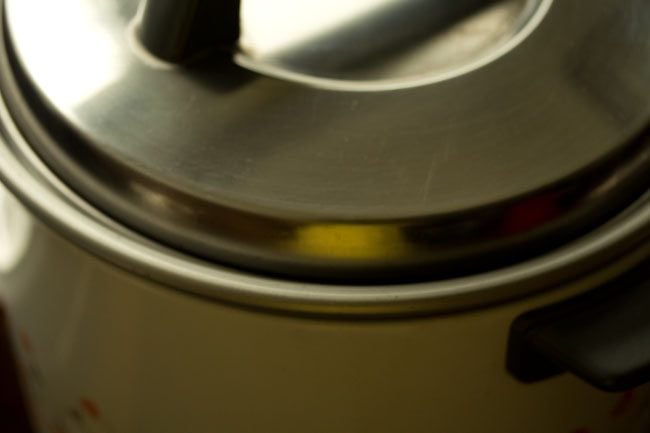 steaming modaks in covered steamer pan. 