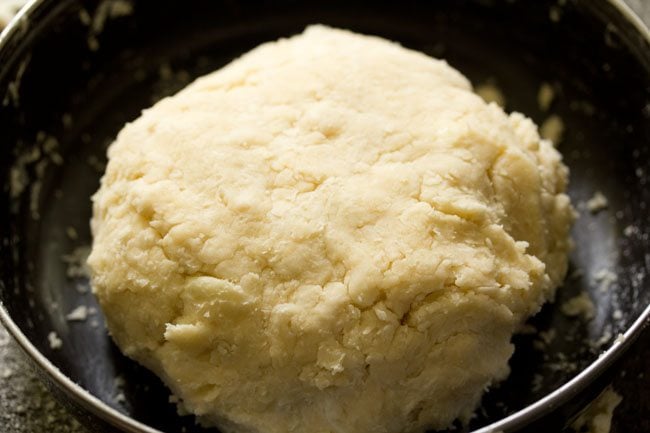 dough for making rough puff pastry has been gathered into a ball to rest.