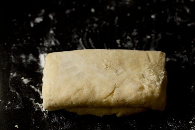 rough puff pastry dough is folded like a business letter.