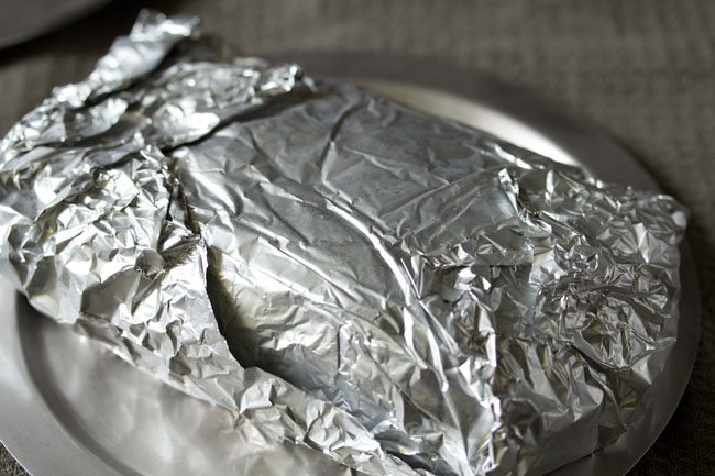 rough puff pastry dough wrapped in foil.