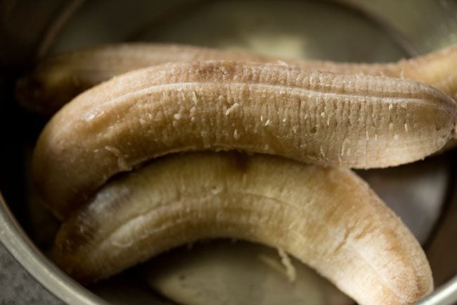 peeled overripe banana in a mixing bowl