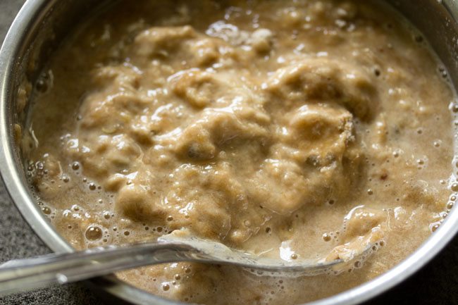 mixing the batter with a steel spoon