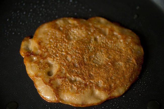 banana pancake flipped and has become nicely golden