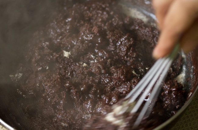 hot batter mixture while mixing to make eggless brownie. 