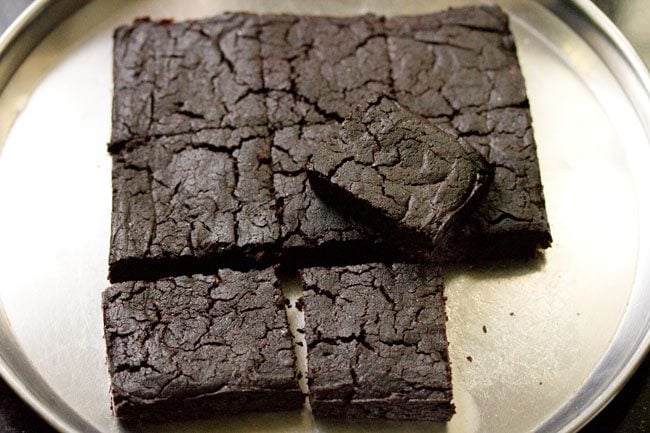 brownie wedges on a steel plate. 