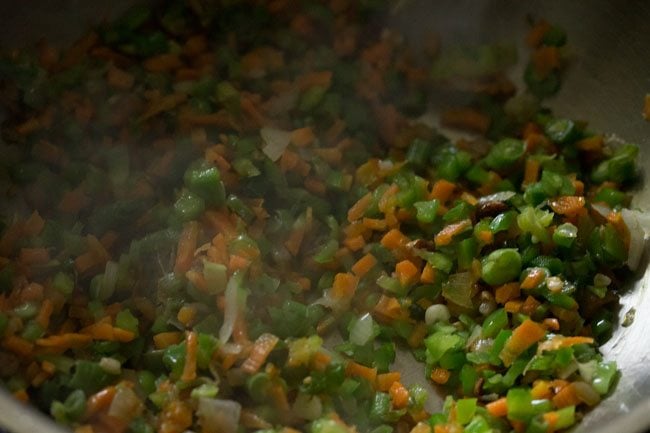 stir and mixing the veggies