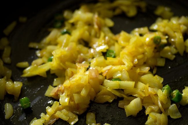 mixing spices with onions