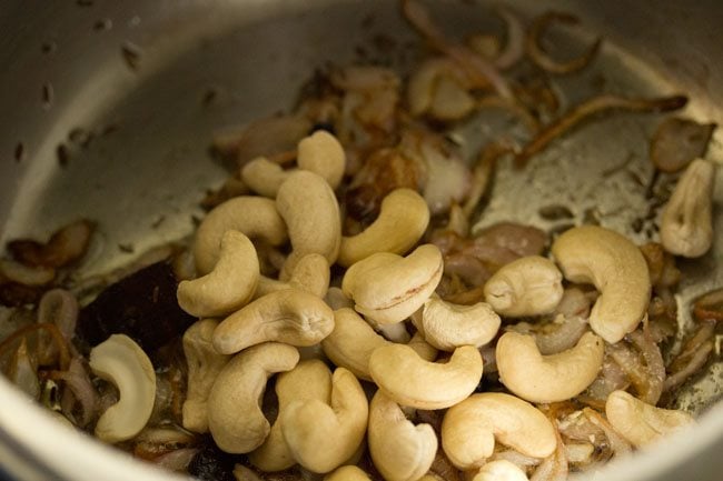 cashews added to the pressure cooker.
