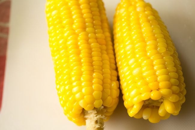 steamed corn on cobs for masala corn recipe. 