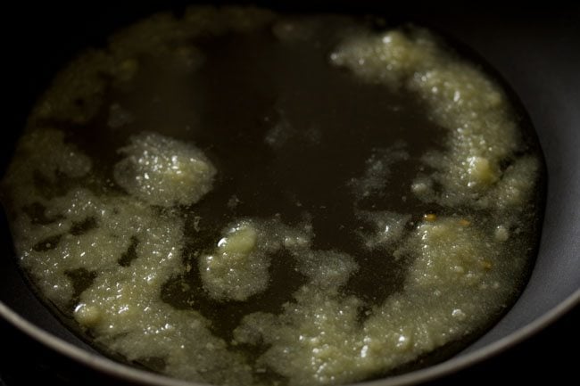 melting ghee in a pan. 