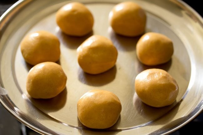 more ladoos shaped from the rest of the moong dal mixture. 