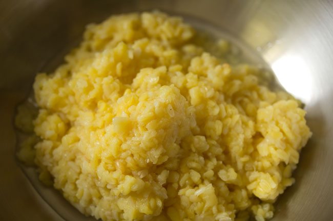 pressure cooked moong dal with water for pasi paruppu payasam. 