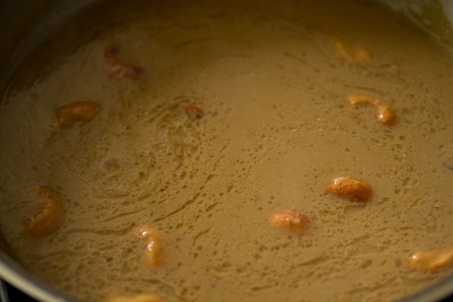 The fried ingredients are mixed well in the payasam. 