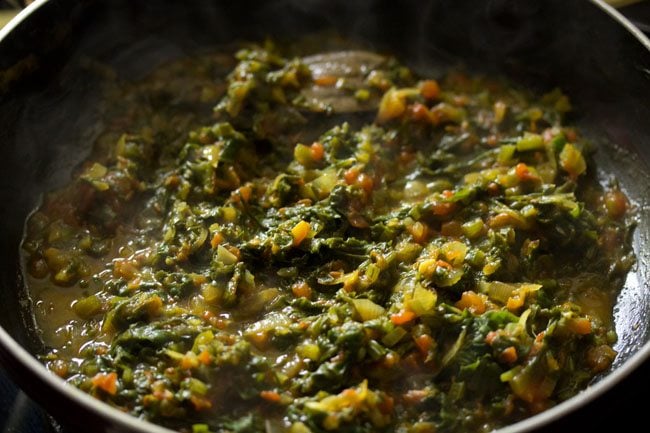 cooking spinach mixture. 