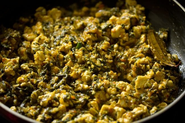 cooking palak paneer bhurji. 