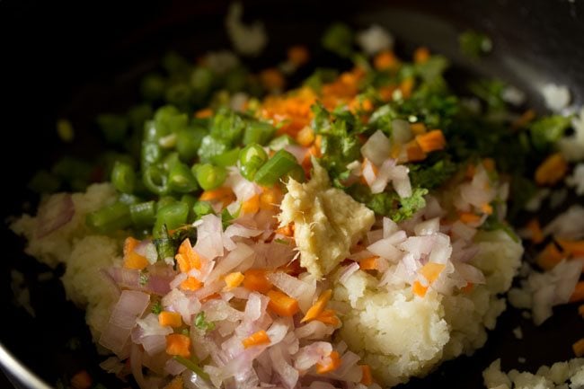 mixed vegetables and ginger-garlic paste added to the mashed potato. 