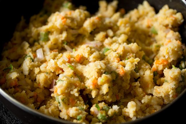 ingredients mixed well in the poha-vegetable mixture. 