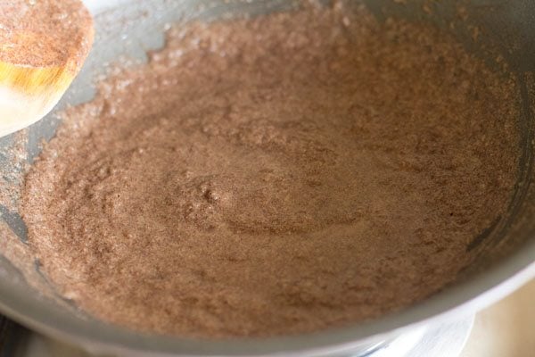 mixing sugar with ragi flour mixture