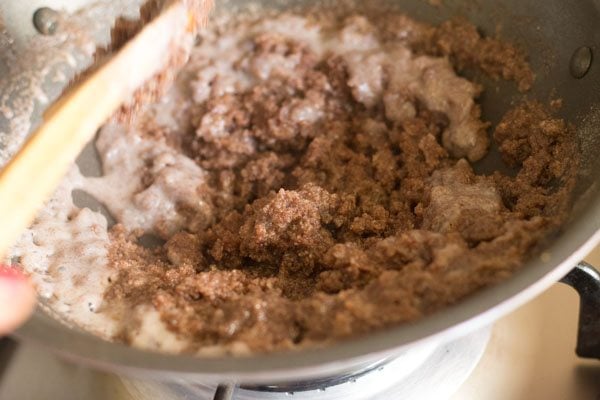 mixing milk with ragi flour mixture