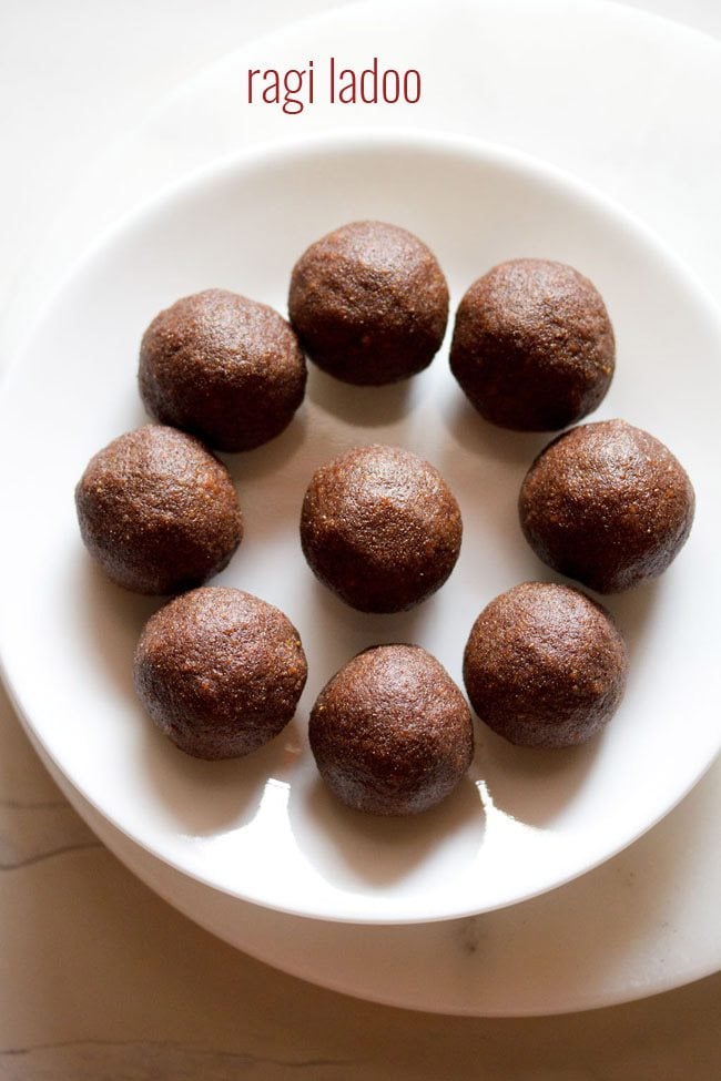 ragi ladoo served on a white plate.